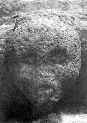 Granite apotropaic figure