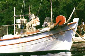 Mediterranean PhotographycYachting: Meganissi...mediterranean heaven green and blue! Vivid boat colours and fisherman equipment