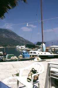 Mediterranean Photographic Yachting: The old yacht of my friends "Augusta"in the Kalamos fishing port; in the firt floor my bag in traditional florenses handcraft fabric...my roots in the world!